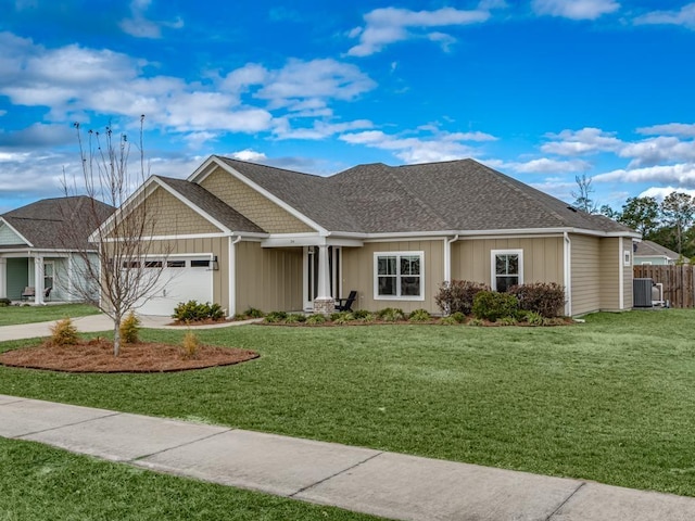 single story home featuring central AC unit, a garage, and a front lawn