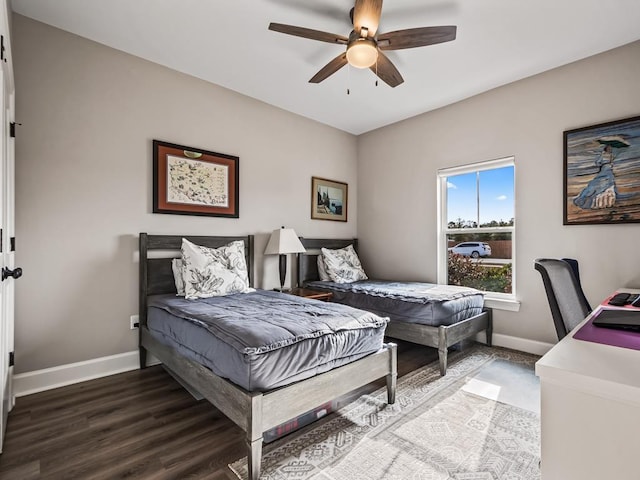 bedroom with hardwood / wood-style floors and ceiling fan