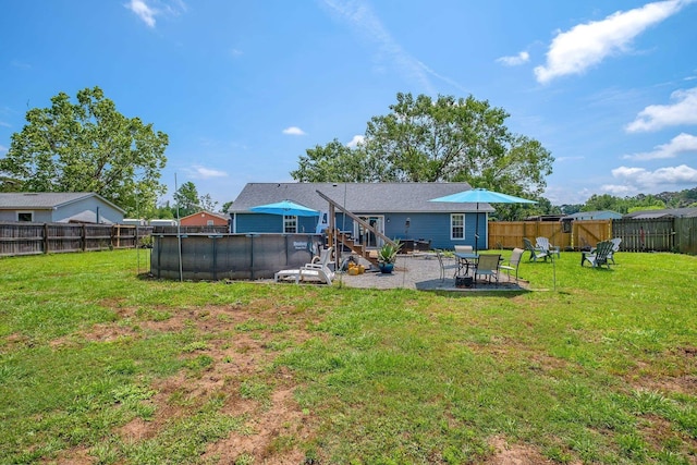 back of house featuring a patio