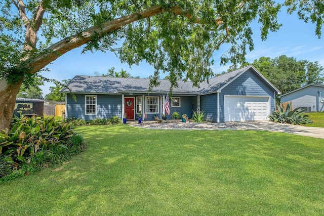 ranch-style home with an attached garage, driveway, and a shingled roof