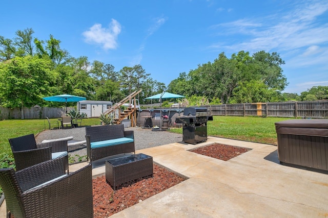 view of patio / terrace featuring a storage shed, an outdoor structure, a grill, and an outdoor living space