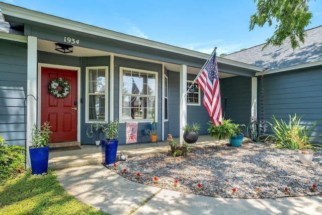 entrance to property with a porch