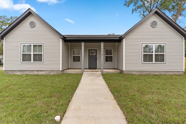 view of front of property with a front lawn