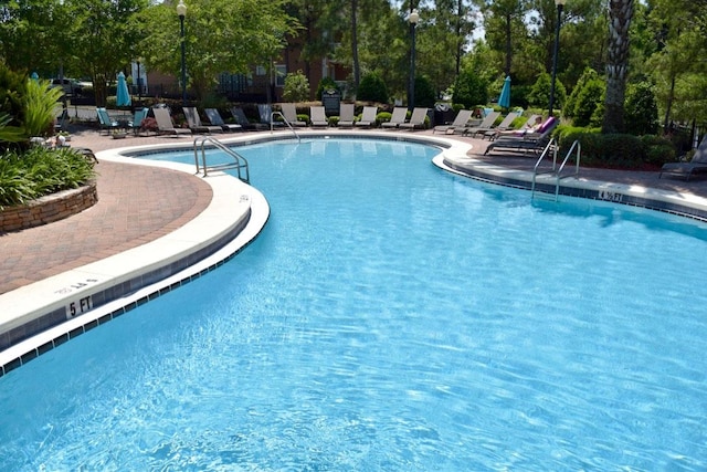 view of pool with a patio area