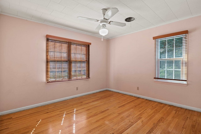615 N Calhoun St, Quincy, FL 32351 - unfurnished room with light wood finished floors, crown molding, and a ceiling fan