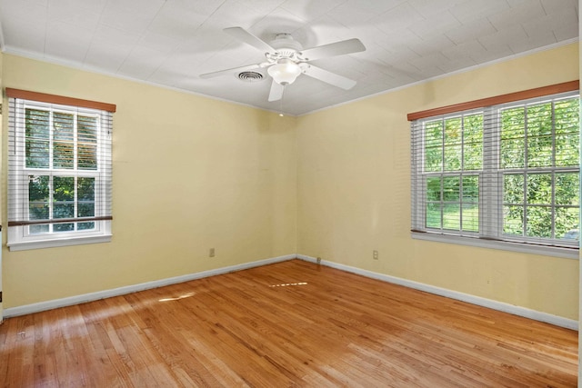 615 N Calhoun St, Quincy, FL 32351 - unfurnished room with plenty of natural light, crown molding, light wood finished floors, and ceiling fan