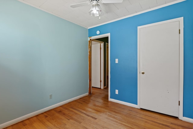 615 N Calhoun St, Quincy, FL 32351 - unfurnished bedroom featuring ornamental molding, wood finished floors, and ceiling fan