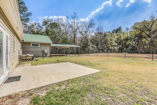 view of yard featuring a carport