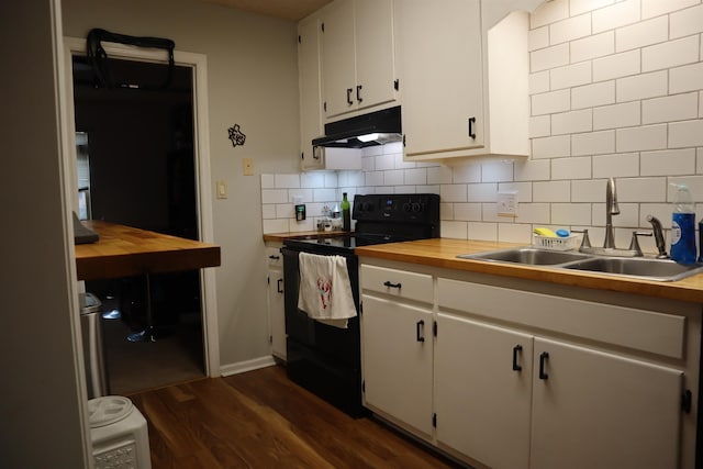 kitchen with tasteful backsplash, black range with electric stovetop, sink, dark hardwood / wood-style floors, and white cabinetry