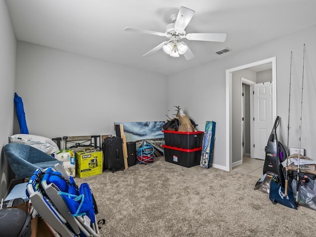 carpeted bedroom with ceiling fan