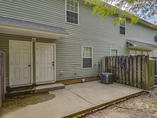 exterior space featuring central AC unit and a patio