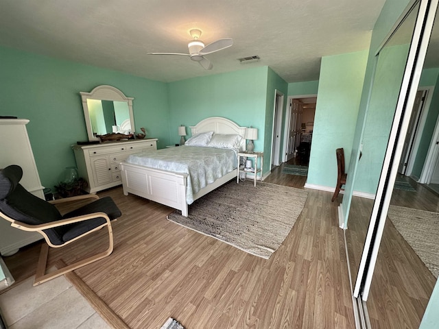 2289 Surf Rd Unit B4, Ochlockonee Bay, FL 32346 - bedroom featuring wood finished floors and ceiling fan