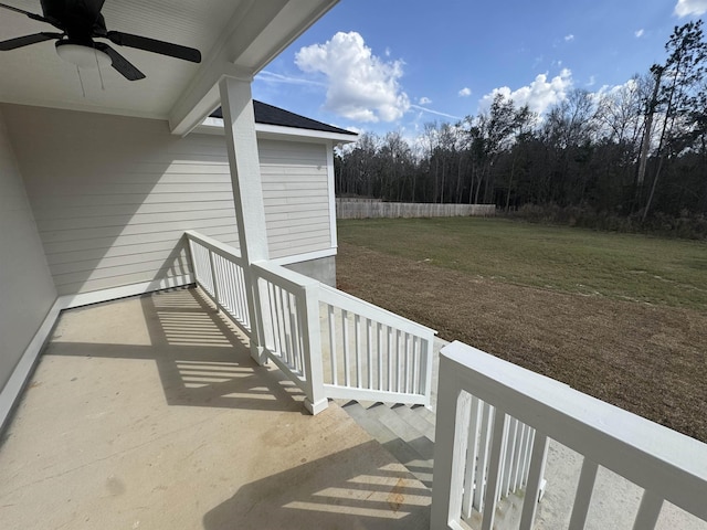 exterior space with ceiling fan