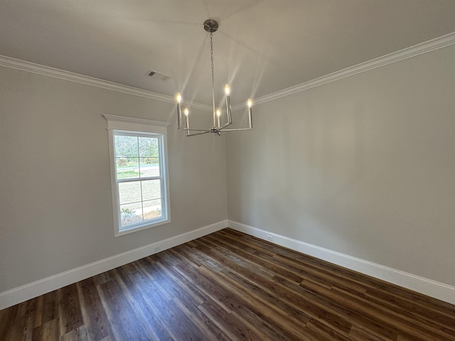 empty room featuring baseboards, visible vents, dark wood finished floors, and crown molding