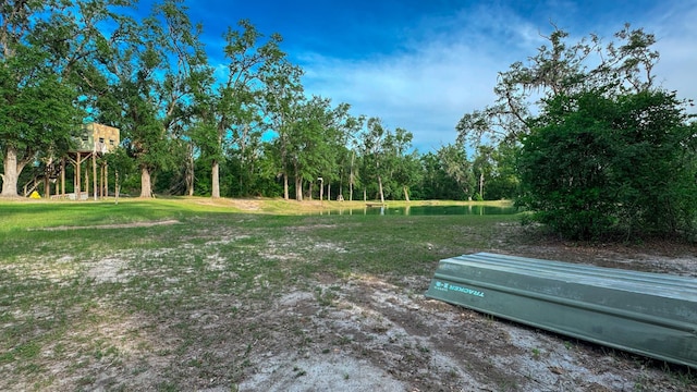 14135 98th St, Live Oak, FL 32060 - view of green lawn featuring a water view