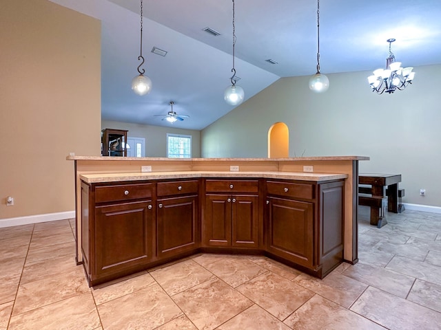 14135 98th St, Live Oak, FL 32060 - kitchen featuring light countertops, vaulted ceiling, baseboards, a ceiling fan, and hanging light fixtures