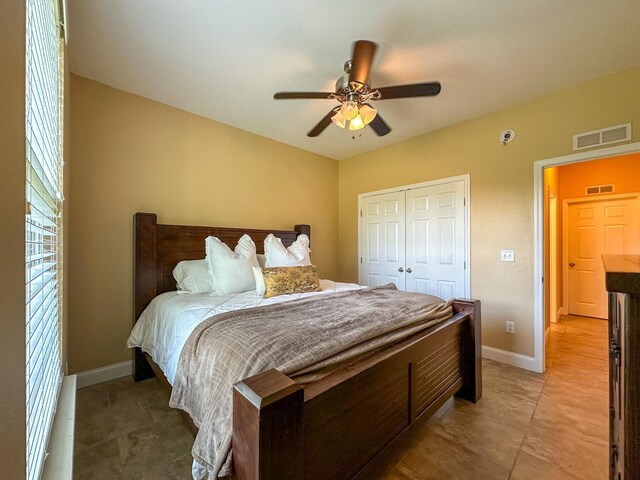 14135 98th St, Live Oak, FL 32060 - bedroom with a closet, baseboards, and ceiling fan