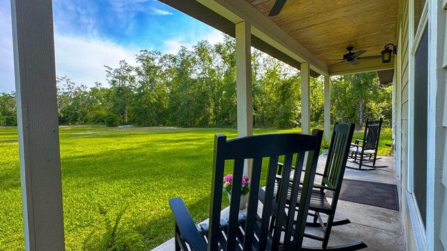 14135 98th St, Live Oak, FL 32060 - covered porch with a ceiling fan and a lawn