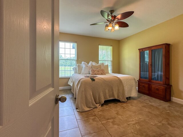 14135 98th St, Live Oak, FL 32060 - bedroom with baseboards and ceiling fan