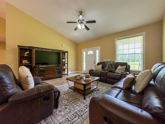 14135 98th St, Live Oak, FL 32060 - living room featuring ceiling fan, vaulted ceiling, and baseboards