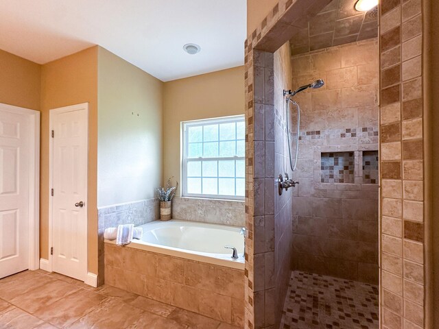 14135 98th St, Live Oak, FL 32060 - full bath with a bath, tiled shower, and tile patterned floors