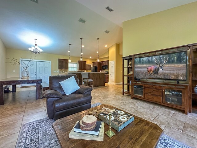 14135 98th St, Live Oak, FL 32060 - living area with a chandelier and vaulted ceiling