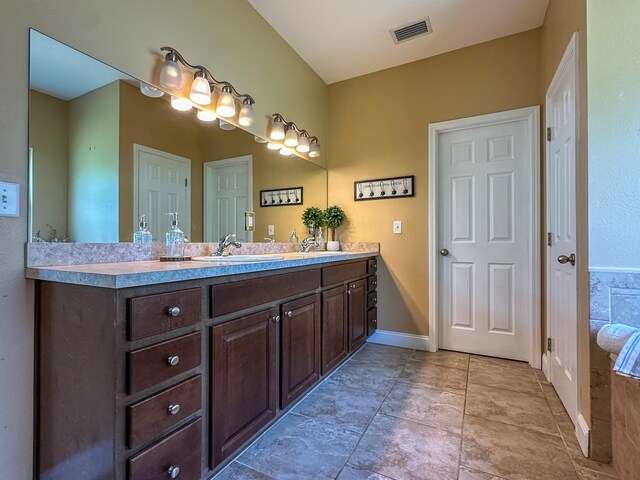 14135 98th St, Live Oak, FL 32060 - bathroom featuring double vanity