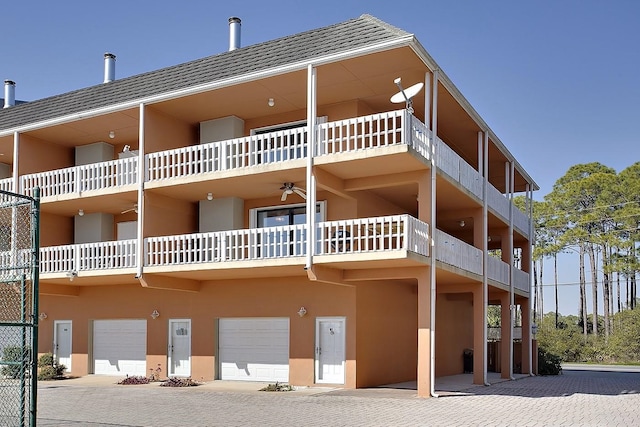 2289 Surf Rd Unit 12, Panacea, FL 32346 - view of building exterior with an attached garage