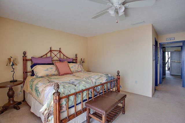 2289 Surf Rd Unit 12, Panacea, FL 32346 - bedroom featuring light carpet, ceiling fan, and visible vents