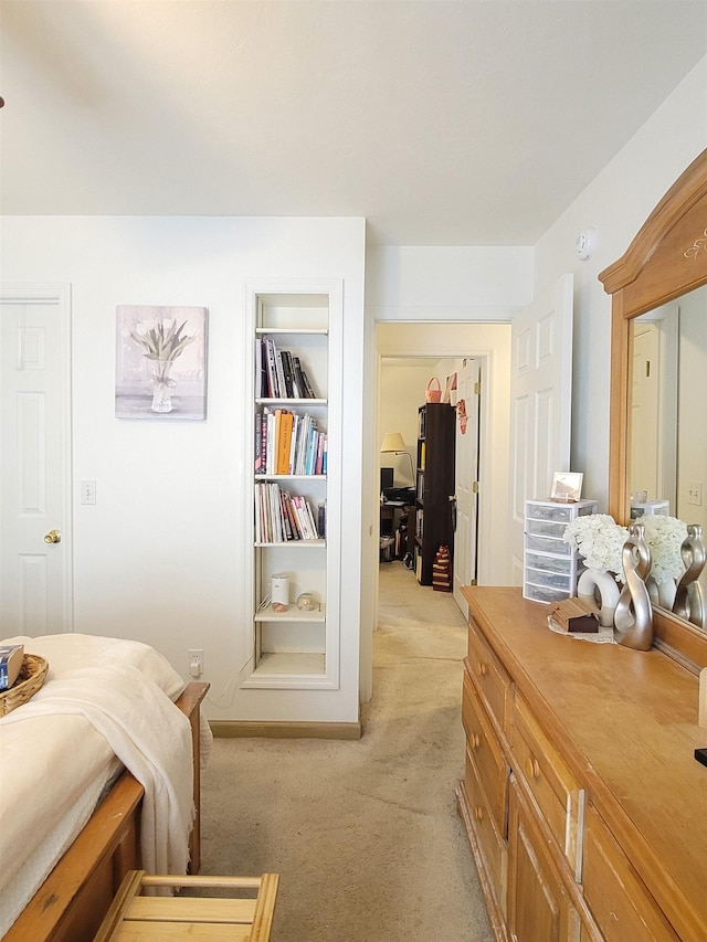 carpeted bedroom featuring a closet