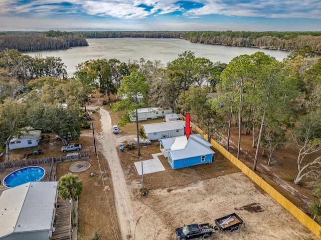 drone / aerial view with a water view