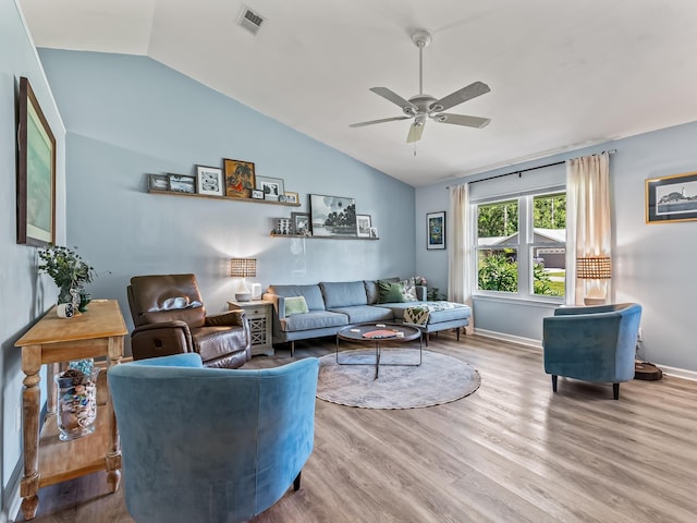 9 Pirates Cove Ln, Saint Marks, FL 32355 - living area with vaulted ceiling, a ceiling fan, and wood finished floors