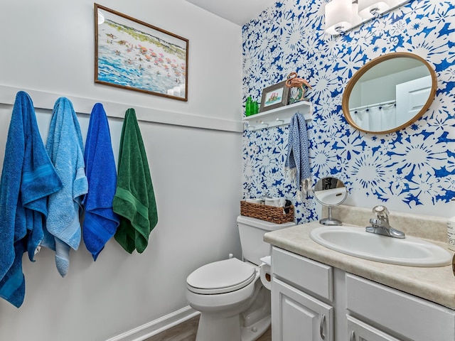 9 Pirates Cove Ln, Saint Marks, FL 32355 - full bathroom with wallpapered walls, vanity, and wood finished floors