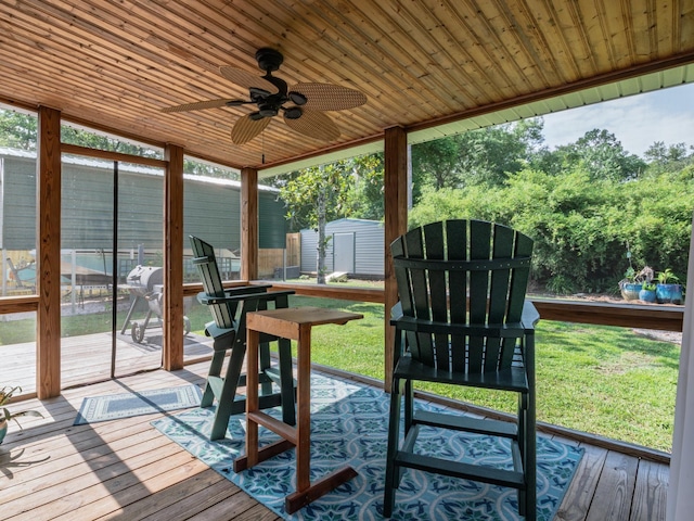 9 Pirates Cove Ln, Saint Marks, FL 32355 - sunroom with a deck, a ceiling fan, wooden ceiling, and wood-type flooring