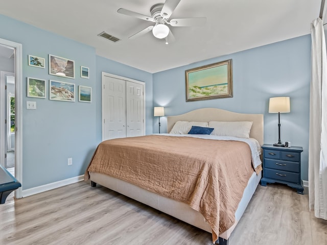 9 Pirates Cove Ln, Saint Marks, FL 32355 - bedroom featuring wood finished floors, a closet, and a ceiling fan