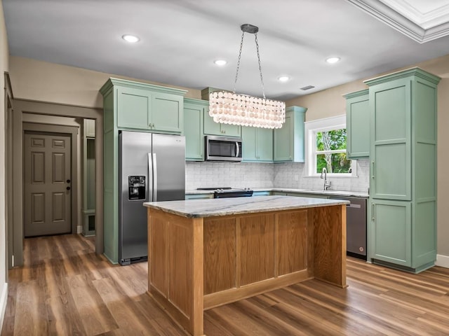 1673 Landing St, Carrabelle, FL 32322 - kitchen featuring appliances with stainless steel finishes, green cabinets, and recessed lighting