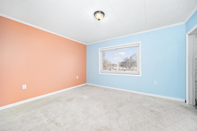 carpeted empty room with ornamental molding