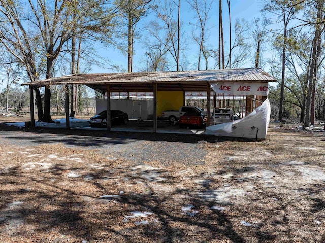 view of car parking featuring a carport