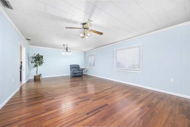 unfurnished living room featuring ornamental molding, dark hardwood / wood-style flooring, and ceiling fan with notable chandelier