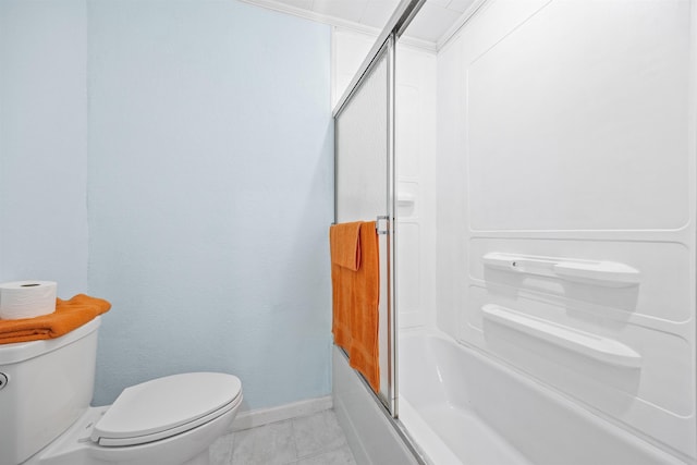 bathroom with toilet, bath / shower combo with glass door, and tile patterned flooring