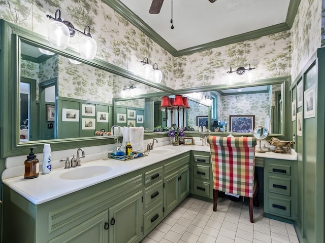 bathroom with tile patterned flooring, vanity, ceiling fan, and crown molding