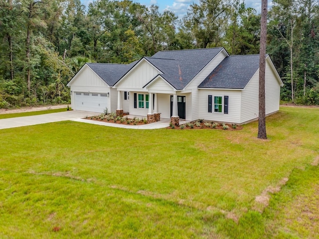 view of front facade featuring a garage and a front lawn