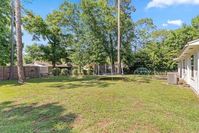 6812 Hill Gail Trl, Tallahassee, FL 32309 - view of yard with a trampoline and central air condition unit