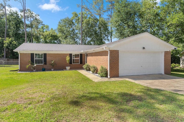 6812 Hill Gail Trl, Tallahassee, FL 32309 - ranch-style house with a garage, driveway, and brick siding