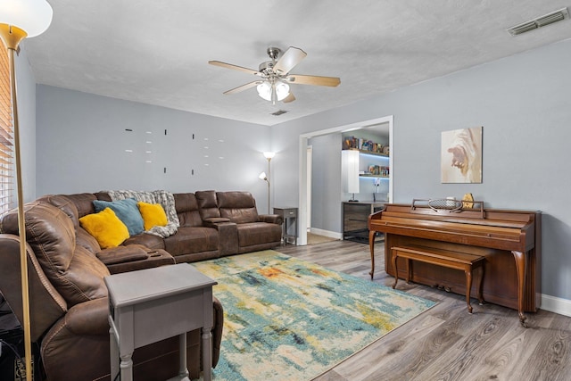 6812 Hill Gail Trl, Tallahassee, FL 32309 - living room with a ceiling fan, wood finished floors, and baseboards