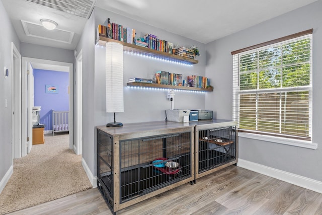 6812 Hill Gail Trl, Tallahassee, FL 32309 - office featuring attic access, wood finished floors, and baseboards