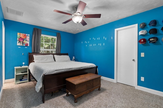 6812 Hill Gail Trl, Tallahassee, FL 32309 - bedroom with baseboards, ceiling fan, and a textured ceiling
