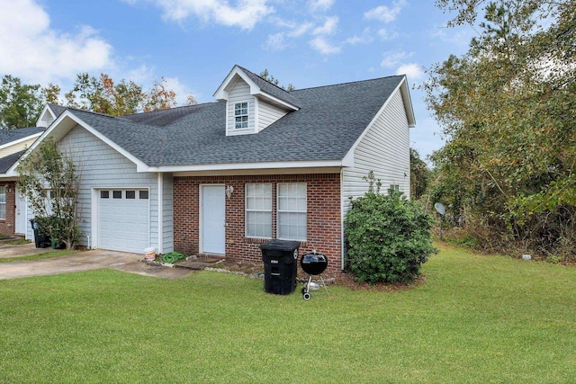 view of front of home featuring a garage and a front yard