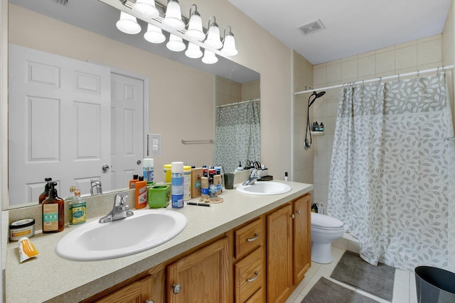 bathroom featuring tile patterned flooring, vanity, toilet, and a shower with curtain