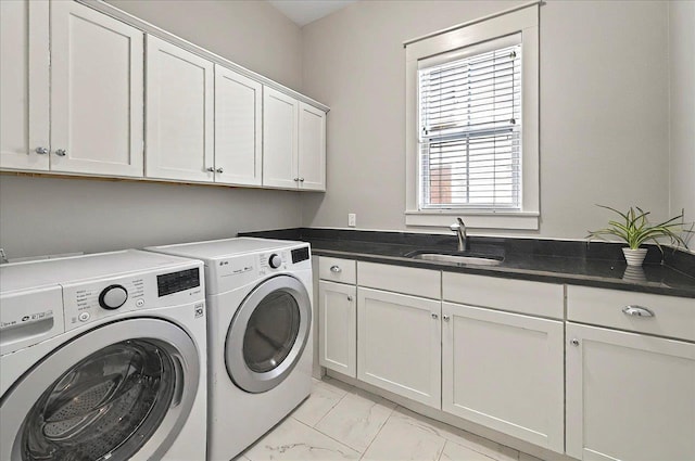 1261 Myrtle View Dr, Tallahassee, FL 32312 - washroom with cabinet space, washing machine and dryer, a sink, and marble finish floor